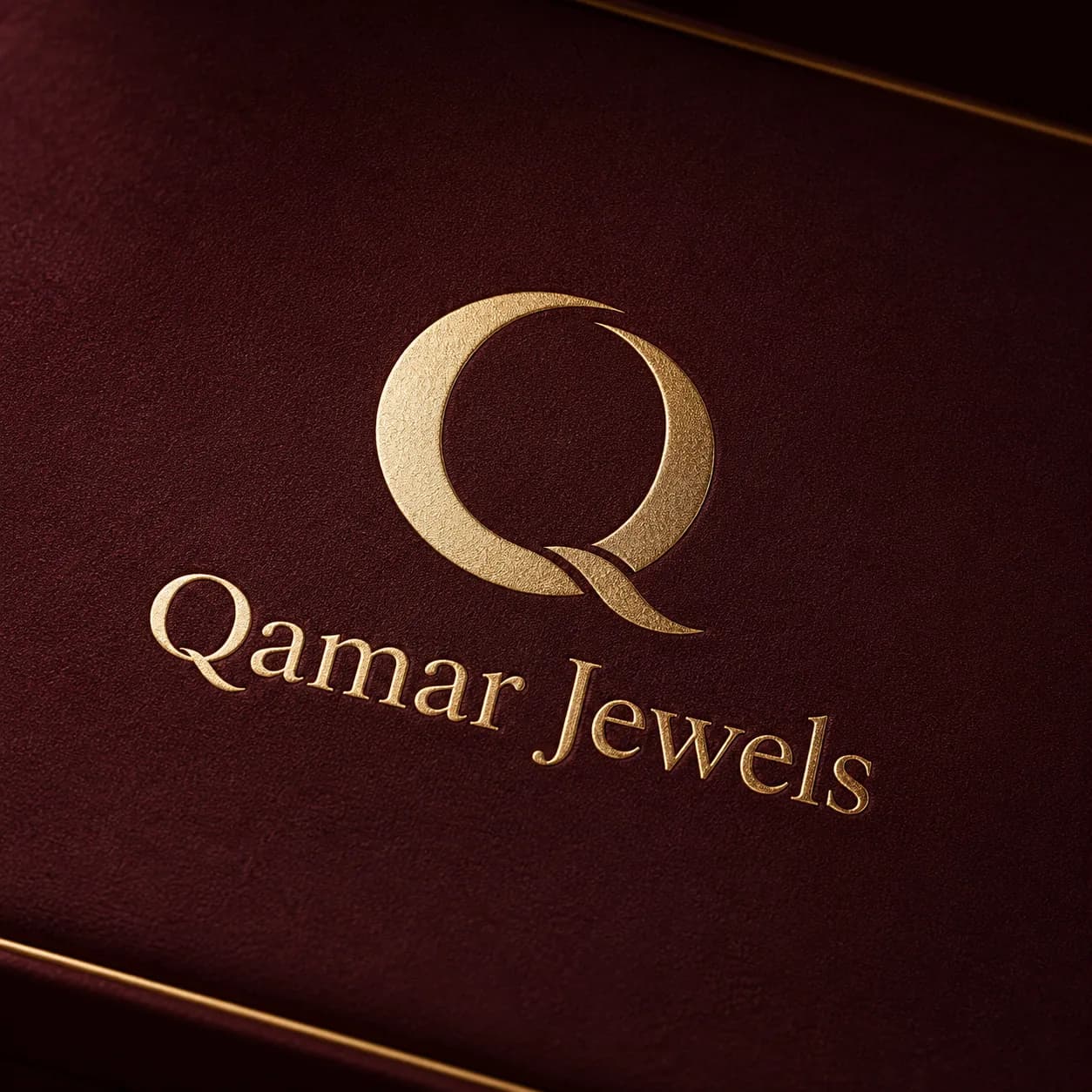 Qamar Jewels embossed branding